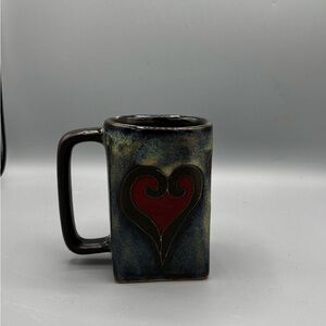 Mara Stoneware Mug featuring a heart design.
